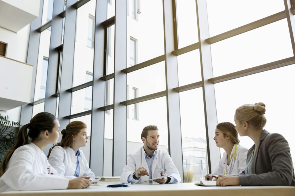 Group of doctors in meeting with consultant